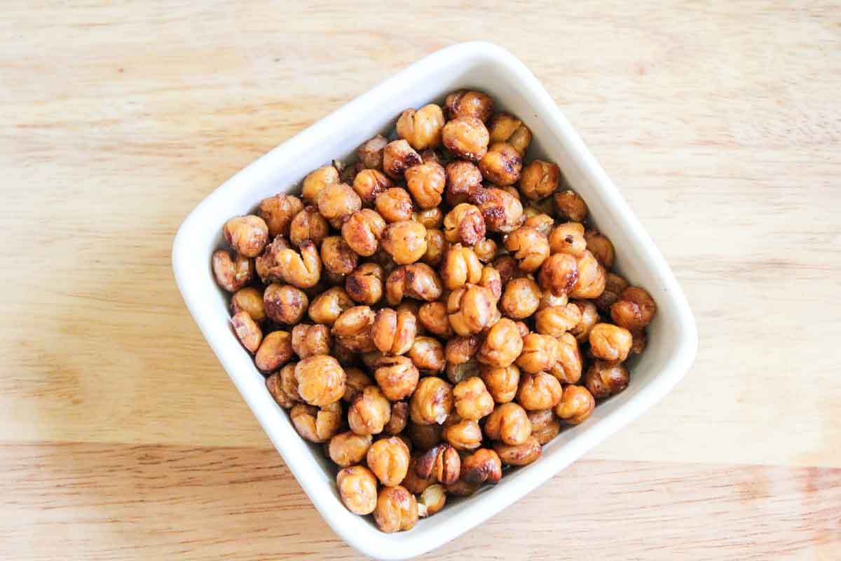 Overhead of a bowl of Crunchy Pumpkin Pie Spice Roasted Chickpeas
