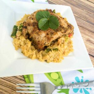 Lemon Thyme Porkchops served with Quinoa, Asparagus & Red Peppers