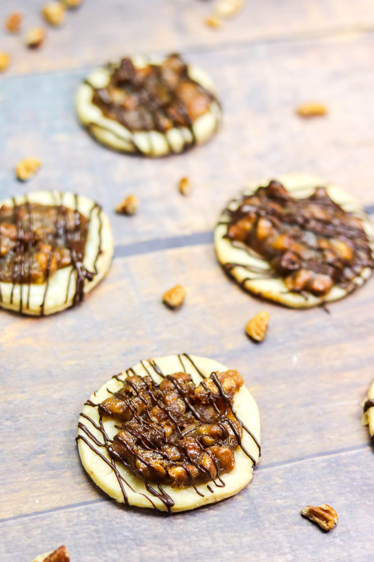 Pecan Pie Cookies drizzled in chocolate