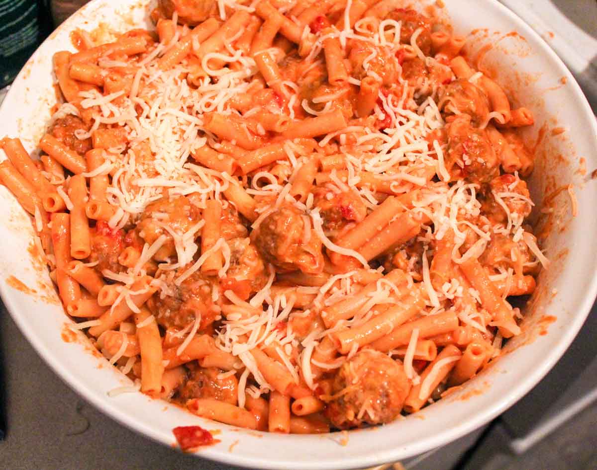 Baked Ziti with Meatballs messy shot in baking dish
